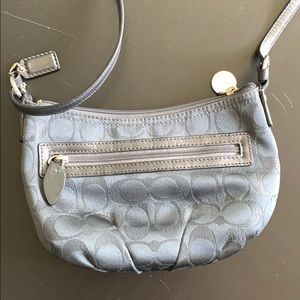 Navy Coach crossbody 9.5 in long and 6in tall